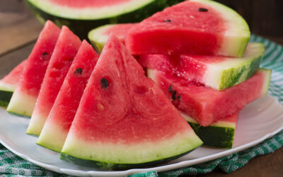 Slices of juicy and tasty watermelon on a white plate